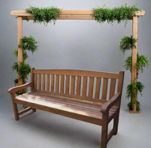 outdoor wood bench made from iroko wood in outdoor garden setting