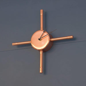 Handmade Copper Wall Clock With Black Hands On Hague Blue Wall