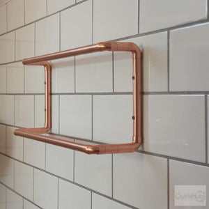 Copper Double Rail Towel Rail On White Tiles